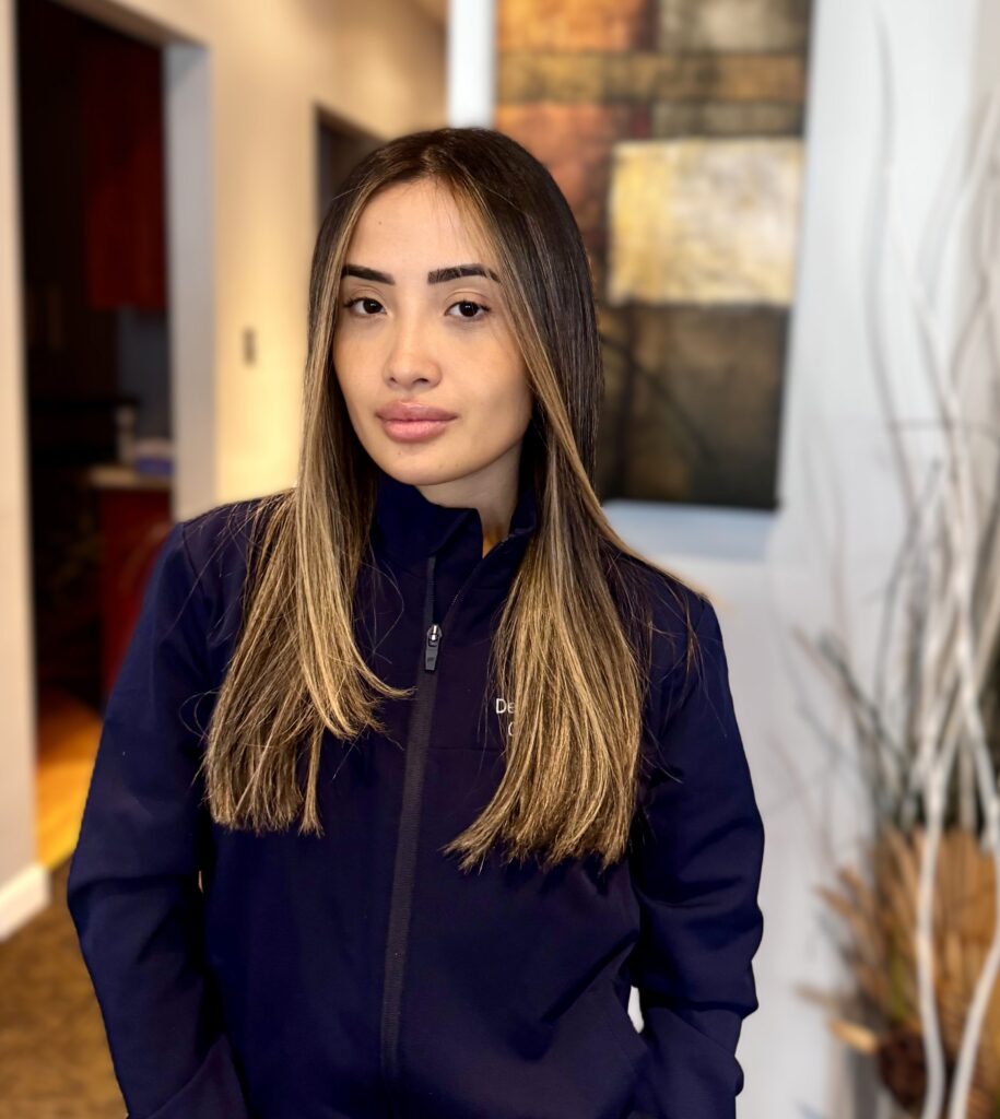 Camila, dental assistant at All Smile Care in Lowell, MA