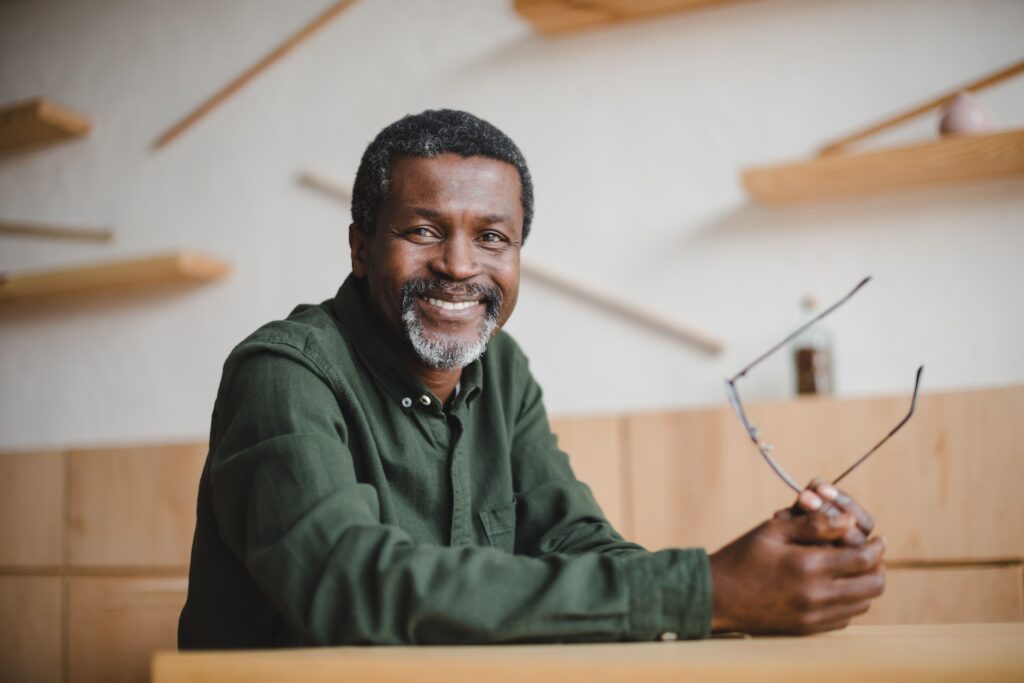 Smiling man after chipped tooth repair at All Smile Care in Lowell, MA